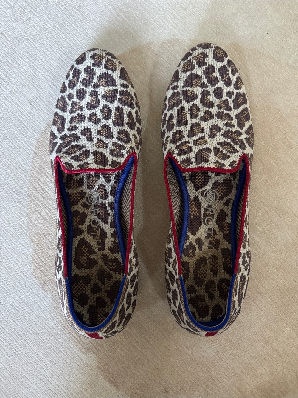 Rothy's Leopard-Print Slip-On Flats with Red and Blue Trim